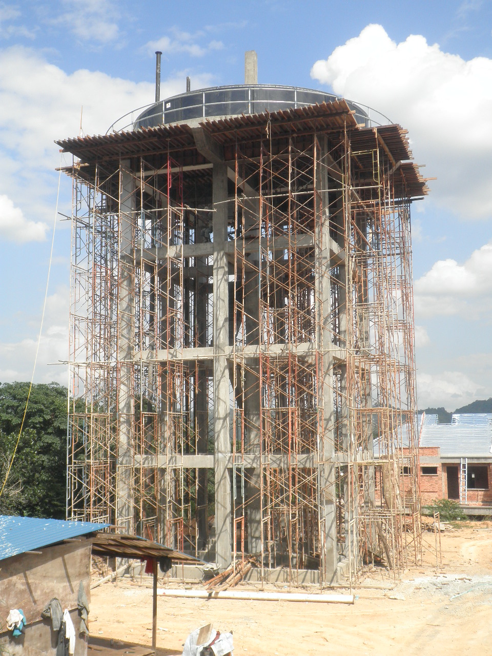 Integrated elevated water tank with access and maintenance features